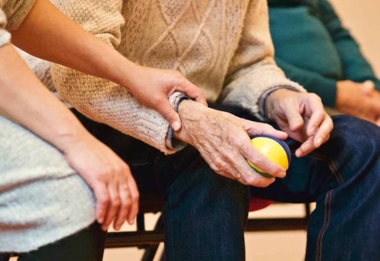 caregiver giving support to patient