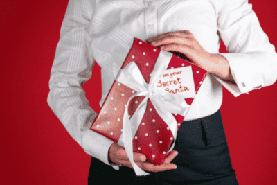 man holding a holiday gift