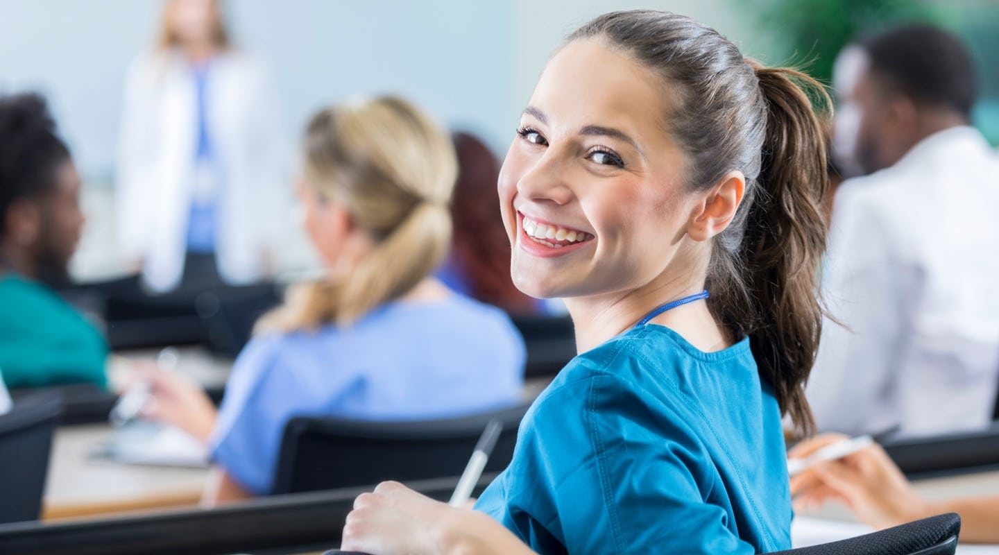 nurse turning around and smiling