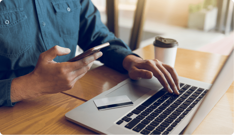 person adding payment information on computer