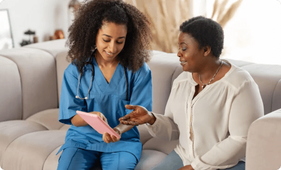 patient and caregiver talking