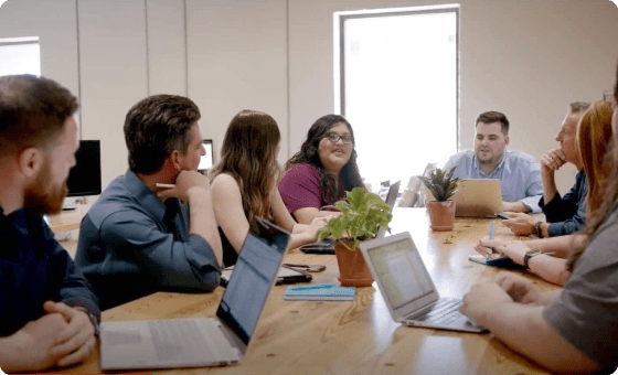 team members working together at conference table