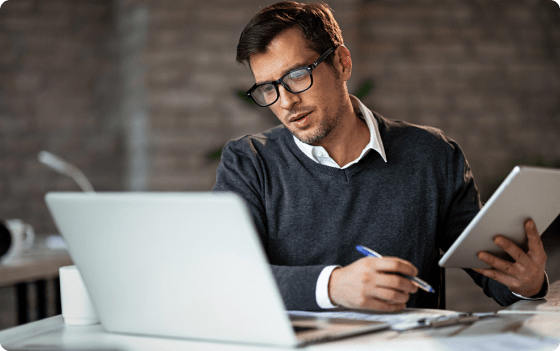 man looking at laptop