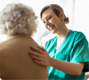 caregiver helping elderly patient
