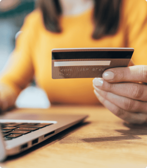 woman holding credit card