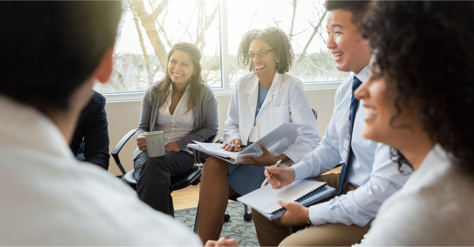 group of medical professionals chatting