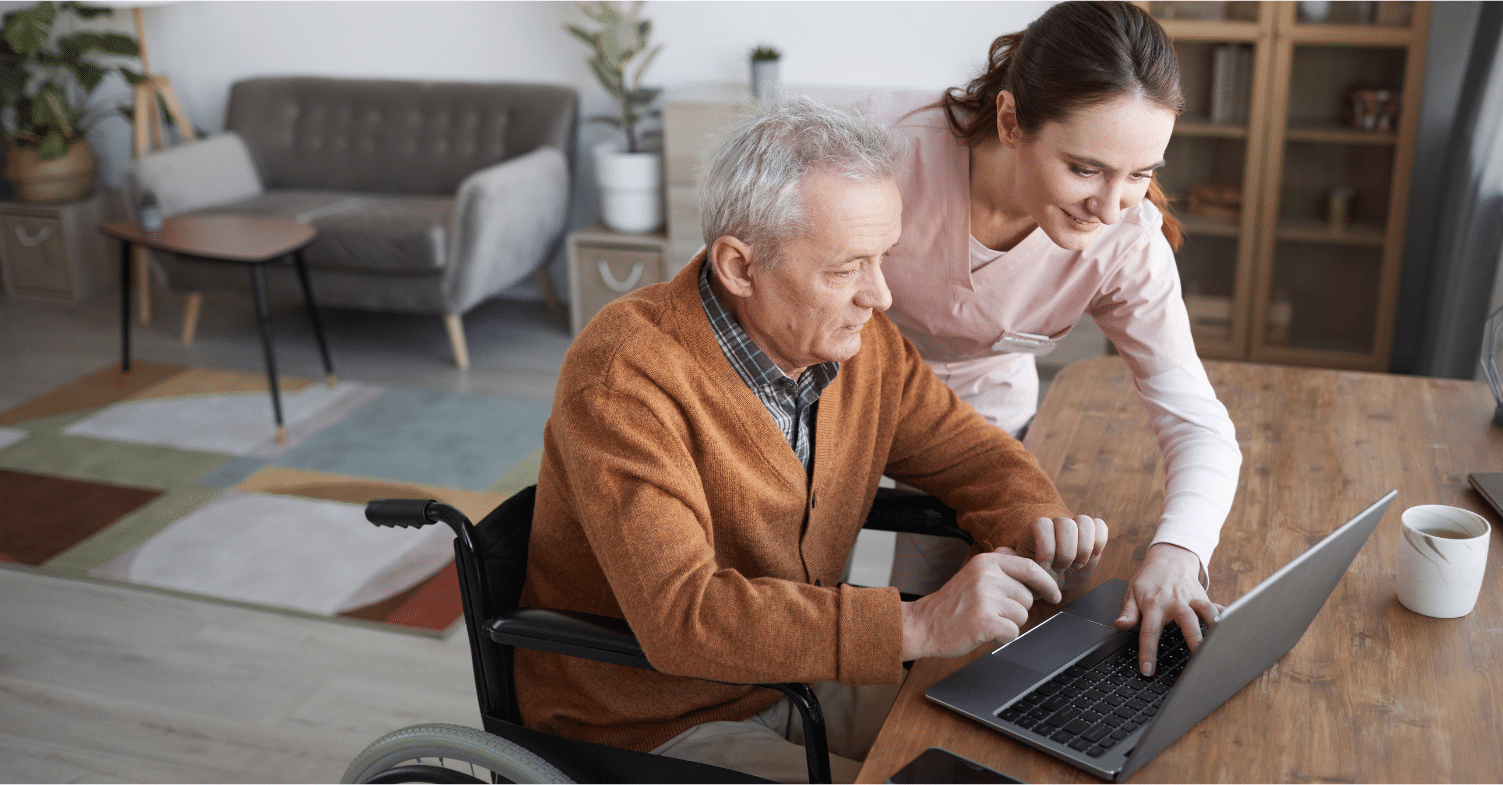 caregiver helping elder with technology featured image